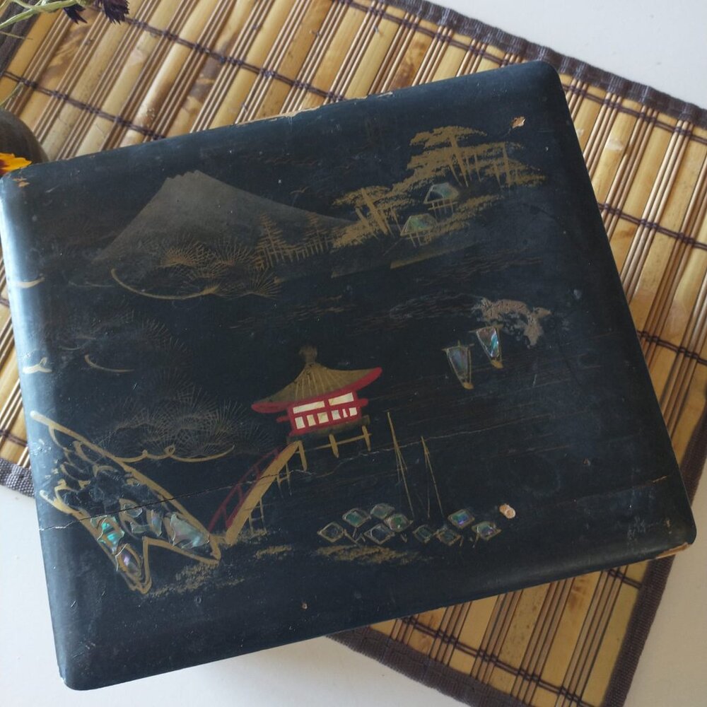 Black vintage jewelry box.